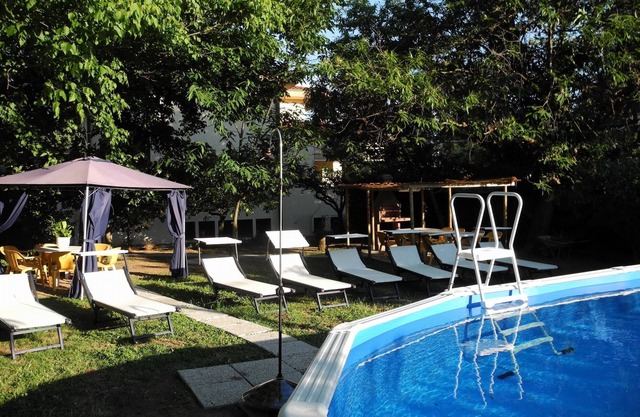 Villahälfte in Massarosa,A/C,Garten,Swimmingpool,Wi-Fi,Dorfnah,bis 8 Personen