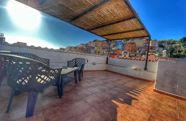 House with Dream Panoramic Terrace in the Heart of Bosa, 80 sqm with BBQ and Breathtaking View