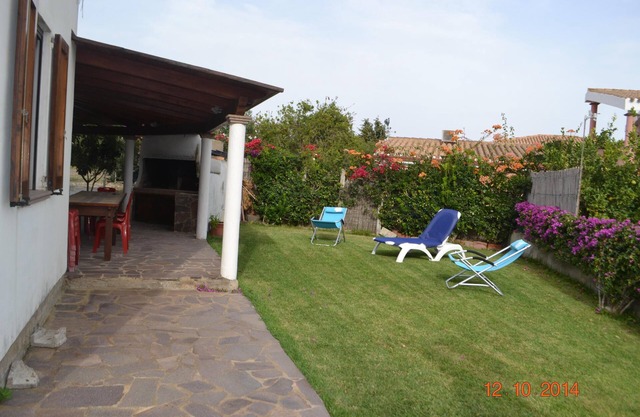 Haus mit Garten und großen Veranden