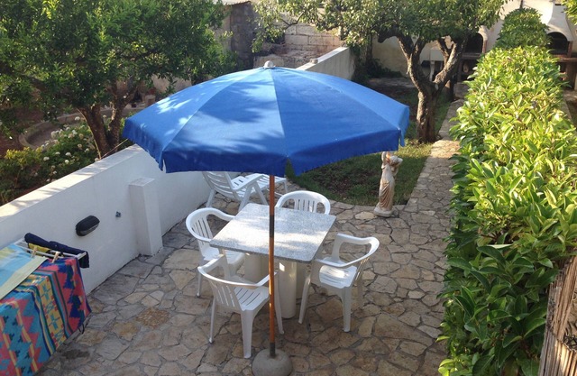 Haus mit Rasen auf den "Malediven von Salento"