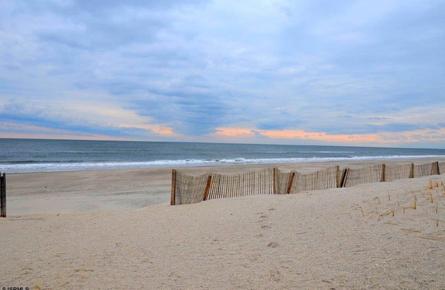 Huge Four Bedroom Two Bath First Floor Condo Across the street From Beach