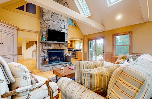 Ideally located spacious home with pool table, large deck, five fireplaces, W/D