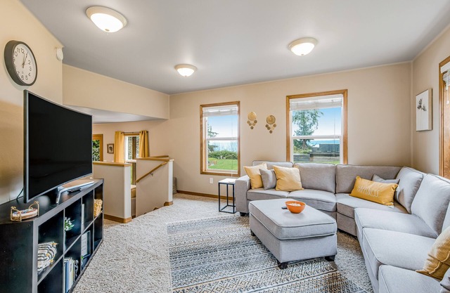 Idyllic woodsy retreat with firepit, two kitchens, Port Susan views & woodstoves