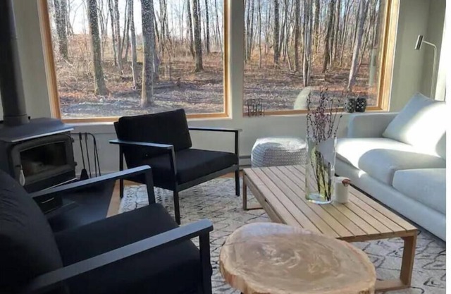 Immerse in your private woods in our modern cabin