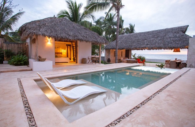 In the Sand Luxury Beach Front Villa w/ climate-controlled Saltwater pool