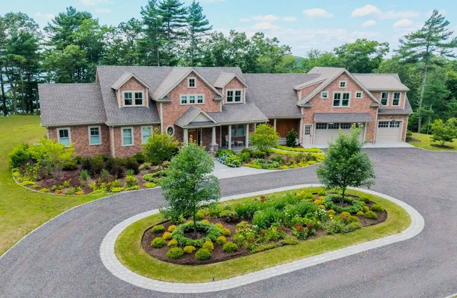 Incredible home on lake with views, private beach, deck, AC, & W/D