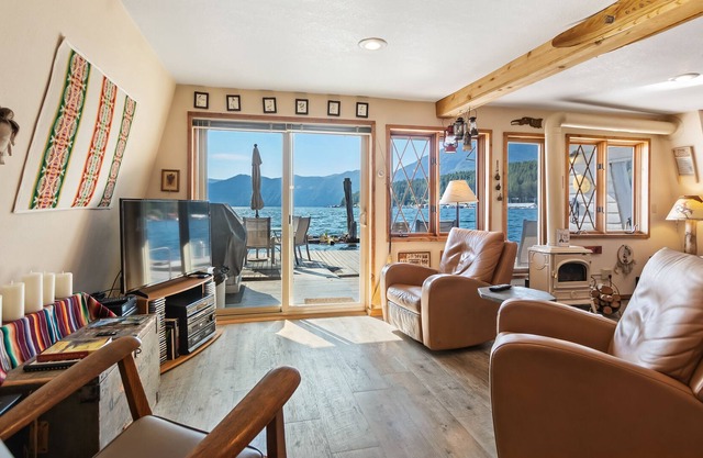 New listing! Incredible lakefront floating home w/lake & mountain views