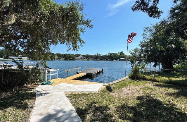 Indian Water Lodge is a waterfront retreat with Dockage, Kayaks, Bikes & More!