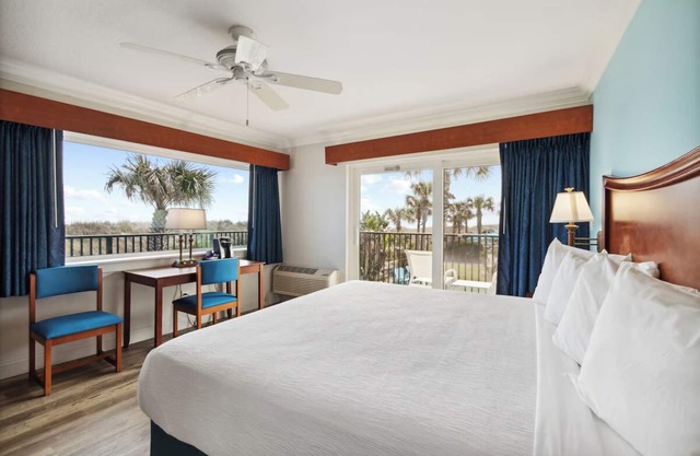 Indulge in a Refreshing Beachfront Room with Nearby Dining and Attractions