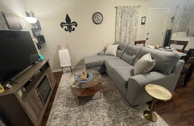 Indulge in stunning bayou vistas from the porch, complemented by essential amenities for a cozy
