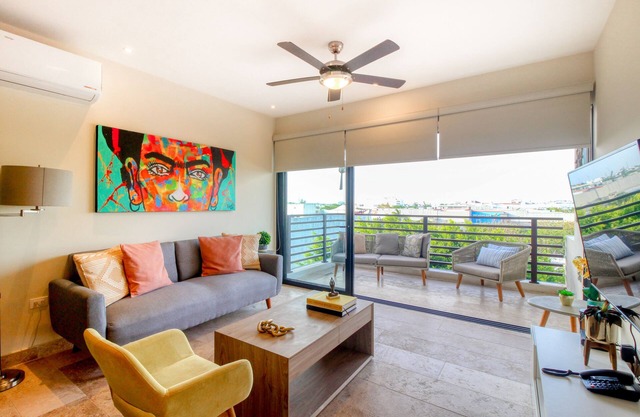 Inviting 4th-floor apartment with balcony, W/D & AC - heated pool & gym access