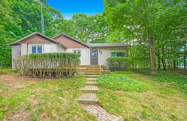 Inviting dog-friendly home with Lake Michigan views & charming sunroom