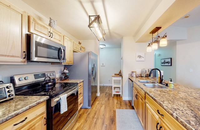 Inviting dog-friendly home with hot tub, grill, patio, central AC, & W/D