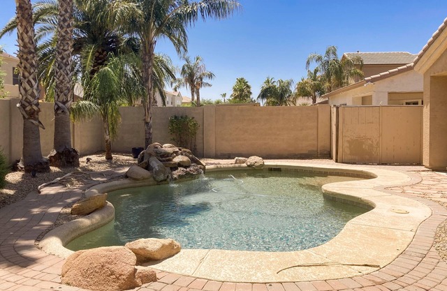 inviting home with private pool, patio, grill, washer/dryer, & central AC