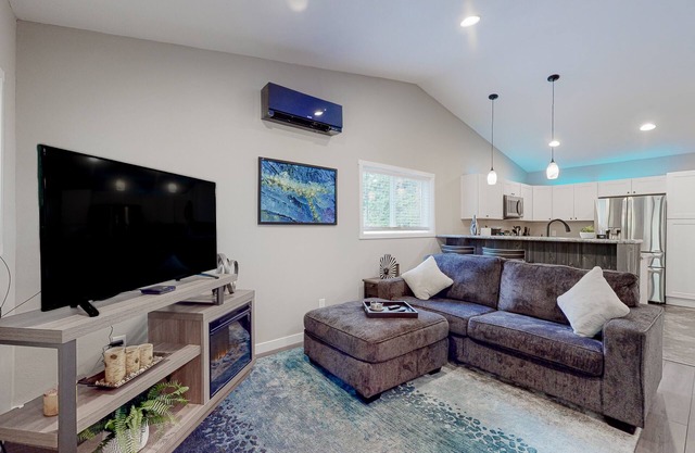 Inviting riverfront home with full kitchen, firepit, W/D, & dog-friendly