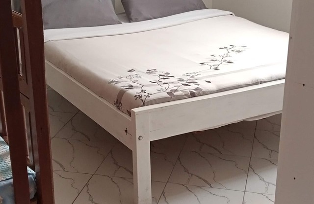 It's an apartment with necessary amenities including a gym