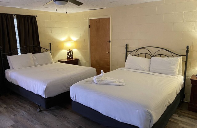 JI8, Queen Guest Room at the Joplin Inn at entrance to the resort, , just 2 1/2 miles from Lake Ouachita. by RedAwning
