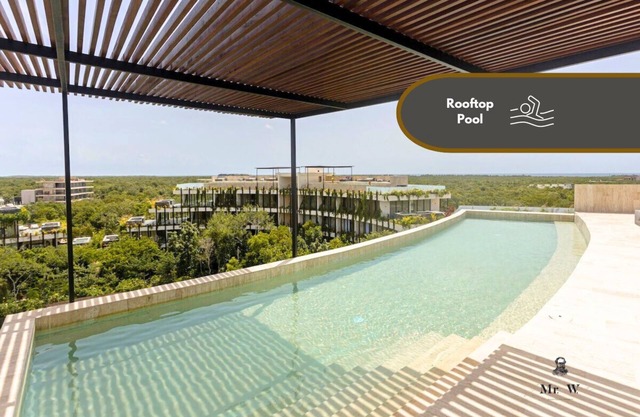 Jungle luxury Stay: Pools, Gym, Beach Access, Fast WiFi!