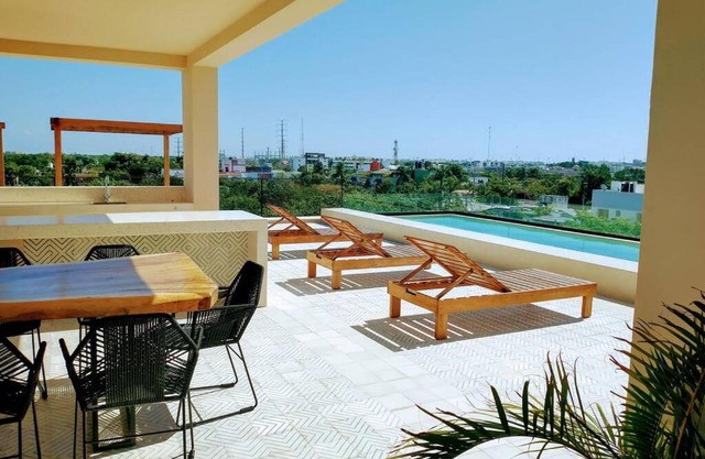 Kaab Atp new vacation Apt with rooftop pool, cozy!