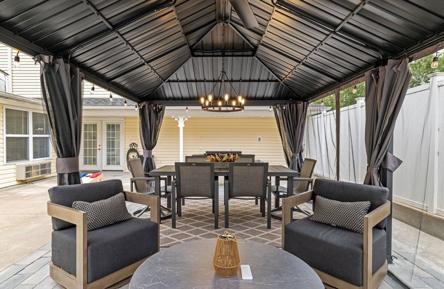 Kimmswick Porch Haven: Hot Tub, Cozy Fire Pit, & Fenced Yard!