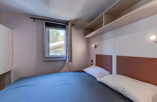 La Croix du Vieux Pont campsite***** - Mobile home Comfort 4 rooms 6 people air-conditioned - TV