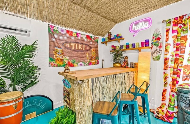 Lakefront Tiki Retreat with Hot Tub!