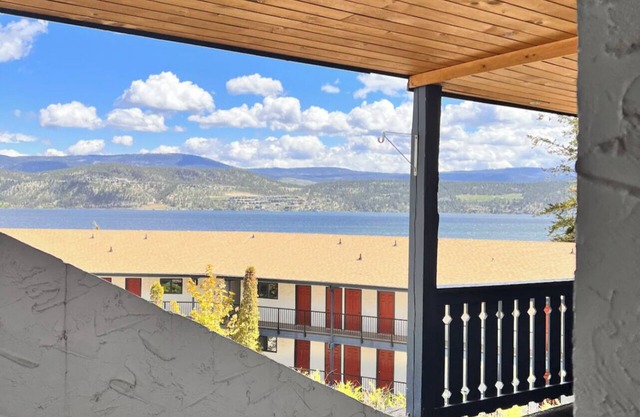 Lake condo seconds from the beach. Enjoy the view from the balcony or dockside.