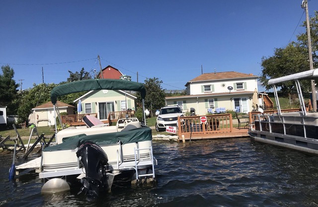 Lake Front 1 bedroom upstairs apartment above 2 bedroom cottage.