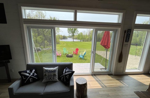 Lake front guest house with sandy beach minutes from biking and hiking trails.