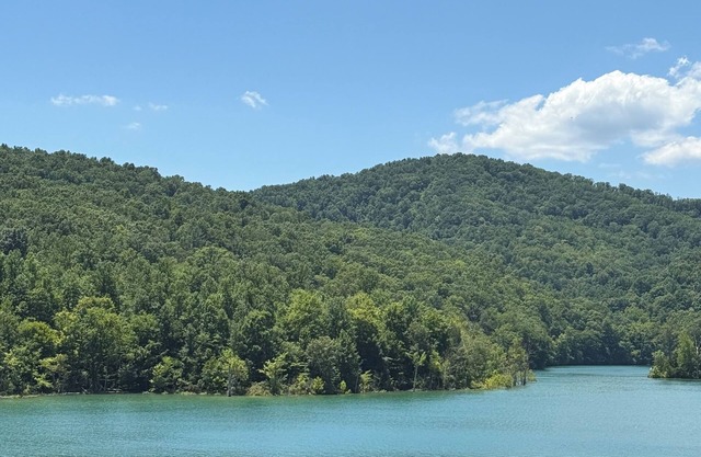 Lake Front Living at its Finest! Location & Views will keep bringing you back!