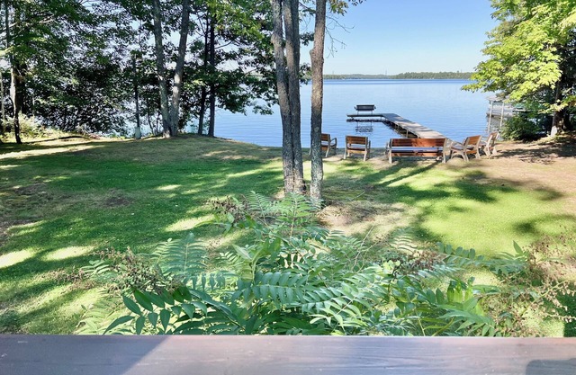Lake front Log Home, 2 bedrooms with a private beach!