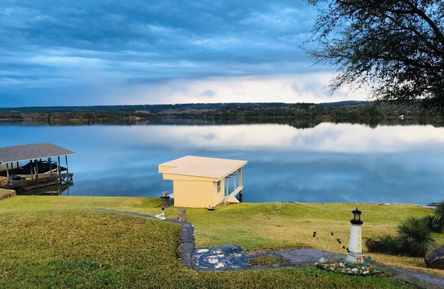 Lake Front property on Inks Lake with beautiful lake views /dock/swimming area.