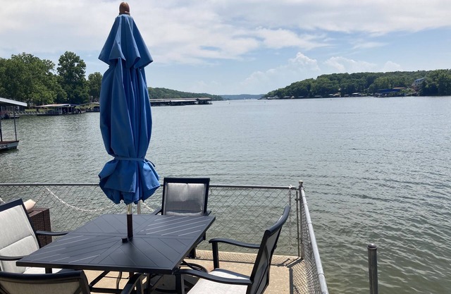 Lake front with view, dock and calm water