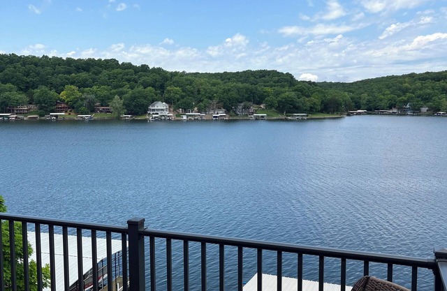 Lake house with three decks private dock and swim platform.
