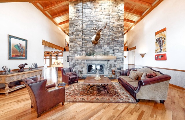 Lake- & mountain-view home with decks, fireplaces, shuffleboard