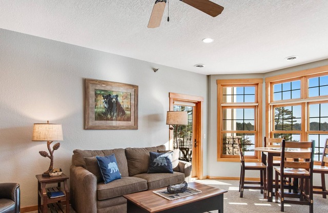 Lake-view condo with indoor pool, hot tubs, sports courts, game room, & gym