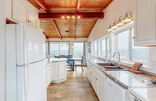 Lake-view countryside haven with deck, two living & kitchens, WiFi, & AC