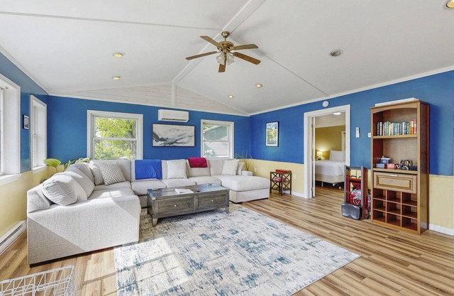 Lake view home minutes from town with deck, fireplace, grill & firepit