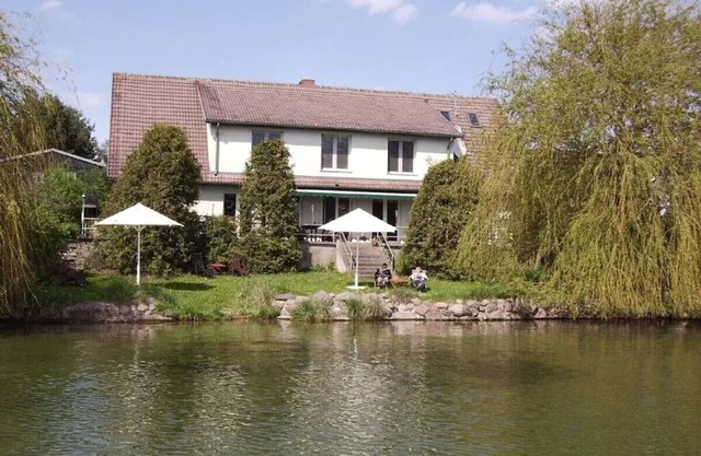 Ferienwohnung Seeblick mit Seeterrasse, Strand, Steg, Bootsliegeplatz