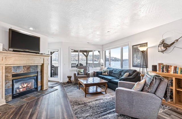 Lakefront Condo w/ Stunning Views, Balcony, & Fireplace