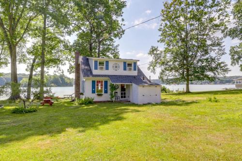 Lakefront Cottage with Covered Porch and Dock!