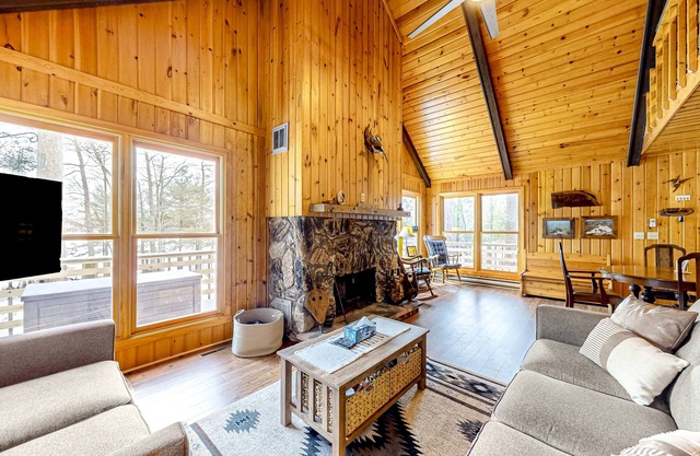 Lakefront dog-friendly retreat with sauna, dock, canoe, paddle board, & firepit
