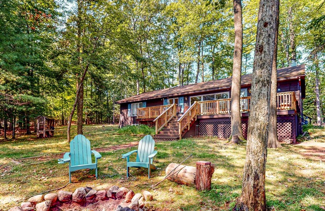 Lakefront, dog-friendly home with canoe, firepit, large deck, & washer/dryer