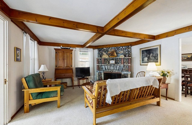 Lakefront dog friendly cottage w/ a dock & beautiful sunset views