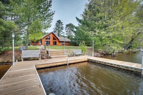 Lakefront Eagle River Vacation Rental with Boat Dock