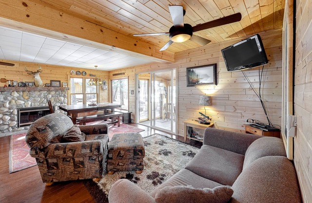 Lakefront home with dock, swimming area, kayaks, & wood stove - sunset views