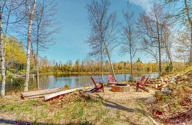 Lakefront home with large patio, fire pit, & a provided kayak