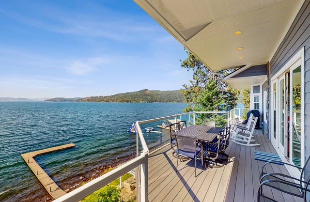 Lakefront Home with a Private Dock, Fireplace, Dance Studio, & Mountain Views