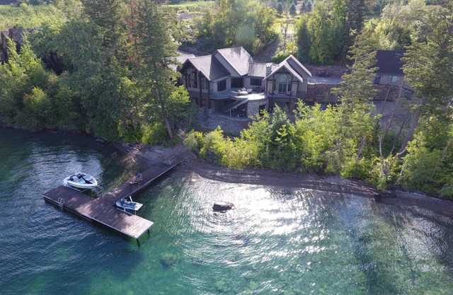 Lakefront home with boat dock & private hot tub!