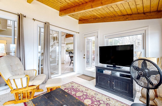 Lakefront home with private beach, dock, kayaks/canoe, & hot tub